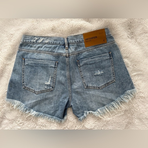 One Teaspoon Blue Distressed Jean Shorts
(Listing #36) - Picture 3 of 7